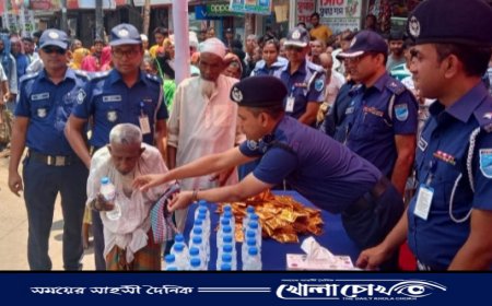 ফরিদপুর জেলা পুলিশের উদ্যোগে  খাবার পানি, স্যালাইন এবং গামছা বিতরণ অনুষ্ঠিত 