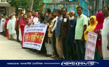 অপসারণ না করার দাবিতে নওগাঁয় মেম্বারদের মানববন্ধন 