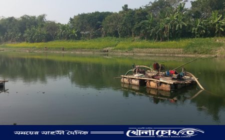 সালথায় কুমার নদে অবৈধভাবে বালু উত্তোলন, হুমকিতে পাকা সড়ক