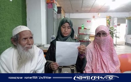 নওগাঁয় বিবাদমান জমি থেকে জোরপূর্বক ধান কর্তনের অভিযোগে সংবাদ সম্মেলন