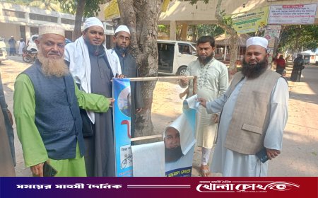 নির্বাচনী বিধি মেনে ফরিদপুর-৪ আসনে মিজানুর রহমান মোল্লার ব্যানার অপসারণ শুরু