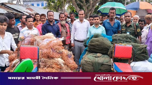 নওগাঁর রাণীনগরে ১০ হাজার মিটার নিষিদ্ধ রিং ও কারেন্ট জাল জব্দ, ব্যবসায়ীকে জরিমানা