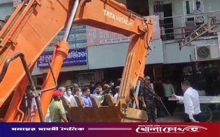 ফরিদপুরে সওজের জমি ও মেডিকেল কলেজ এলাকায় অবৈধ স্থাপনা উচ্ছেদ