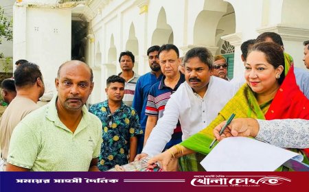 ফরিদপুরে পৌরসভার উদ্যোগে পূজামণ্ডপগুলোতে শাড়ি বিতরণ